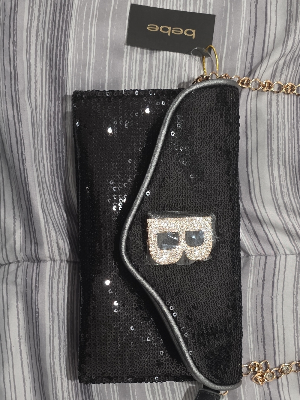 bebe Black Sequin Wristlet with Gold 'B' Logo